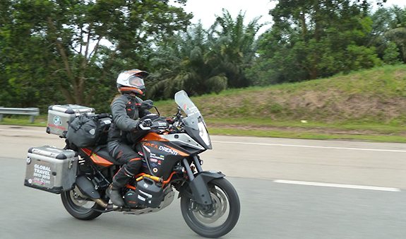 Riding along Malaysian roads.