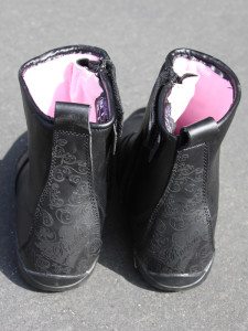 Joe Rocket Trixie Waterproof Boots have a pink comfort lining and a removable insole.