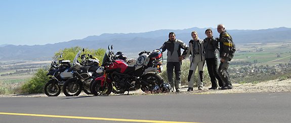 We met up with friends Nik and Jessica during a Baja trip. Leah’s FZ-09 became a sport tourer with a spare gallon of gas and a Giant Loop Great Basin saddlebag.  We stopped for a photo on the rim of Valle de Trinidad while riding from Ensenada to San Filipe, where we’d camp a few nights on the beach while boiling fresh shrimp to accompany the pina colodas that peddlers driving up and down the beach would whip up and serve in the fresh pineapple’s husk.