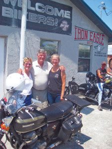 You meet the nicest people—Win and nieces Alison and Pam visit the Iron Eagle Bar in Okeechobee, Florida, accompanied by Alison’s husband, Kirk, on the Harley. 