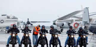 The scene from on the flight deck of the USS Yorktown while six veterans and active-duty military ride the H-D Street 500 as Harley-Davidson announced it is offering current and former U.S. military free Riding Academy motorcycle training. (Mic Smith/AP Images for Harley-Davidson)