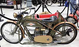 his 1958 Simplex Servi-Cycle features a two-stroke single and sidecar.