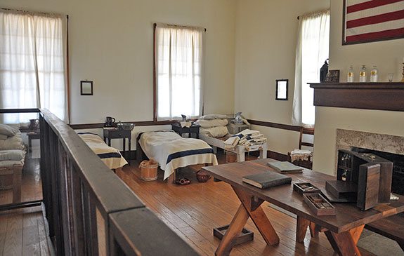 A period-correct recreation of the hospital ward at Fort Scott; relatively plush by frontier standards. 