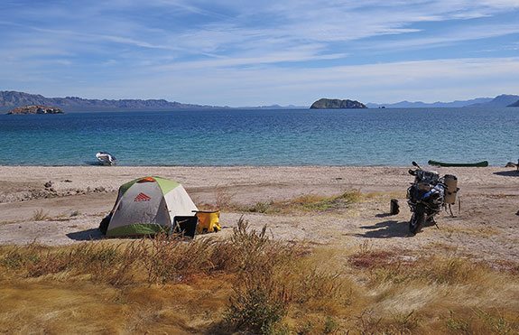 One of the joys of camping is finding remote spots where the nearest lodging is many miles away, such as this idyllic spot on the Sea of Cortez.