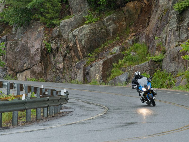 The R 1200 RS's partial fairing and manually adjustable windscreen provide good weather protection.