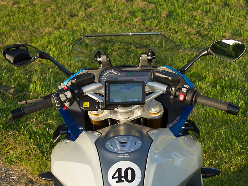 Analog speedo is paired with an LCD with three display modes. Multi-Controller wheel on the left grip operates the accessory Navigator V GPS ($799). Optional Keyless Ride allows the bike to be started and the gas cap opened without a key.