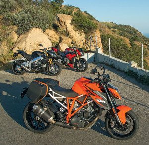 The KTM 1290 Super Duke R was delivered to us with factory accessory saddlebags and heated grips, and a tankbag and tailbag are also available—which makes sense because the KTM is by far the most comfortable bike in this comparo. BMW offers a tankbag and a tailbag for the S 1000 R, and Aprilia makes a tankbag for the Tuono. Given the speeds these bikes are capable of—in an instant, with a flick of the wrist—we recommend bolting on a windscreen to provide some wind protection. We tried an aftermarket screen on the BMW and it made a big difference.