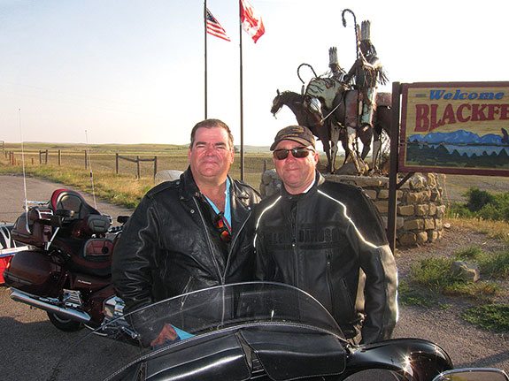 At the entrance of the Blackfeet Nation I stopped to take pictures of a very impressive Jay Laber sculpture, when Dale Aucoin on his ’08 Honda rollead in. With him on his 2014 H-D was Dwayne Guillory. Seems Dwayne had been on his new bike more than he’d been off. Since February, he’d rolled the odometer past the 17,000-mile mark. That’s hitting the road.