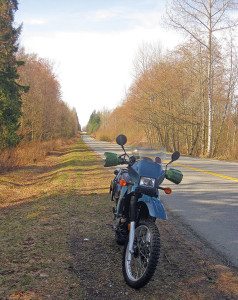 The Kawasaki KLR650 rests just off Zero Avenue. The secondary road near White Rock, British Columbia, takes motorcyclists along the Canada/U.S. boundary, sometimes just a few feet away from the border itself.