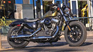 Powered by the air-cooled, 73ci Evolution V-twin, the Sportster Forty-Eight joins the Dark Custom ranks for 2016, and it gets better suspension, a more comfortable seat and lighter wheels. 