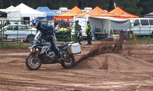 Expert riders treat behemoths like motocrossers on the demo course.