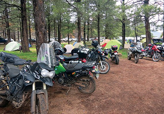 Motorcycle campers brave the elements to experience the Overland Expo West.