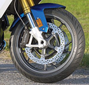 Integral ABS links the radial-mount Brembo calipers up front with the rear brake.