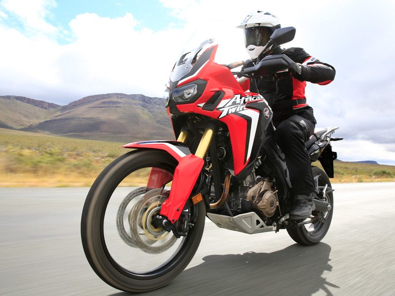 The Honda Africa Twin offers good road comfort but modest power compared to many open-class ADV bikes.