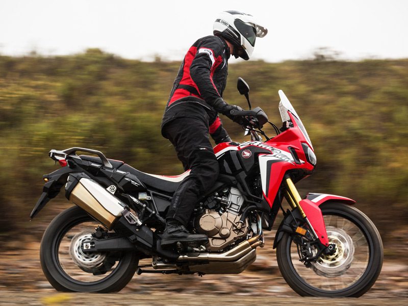 Slender dimensions and sensible ergonomics make the Africa Twin a pleasure to ride while seated or standing.
