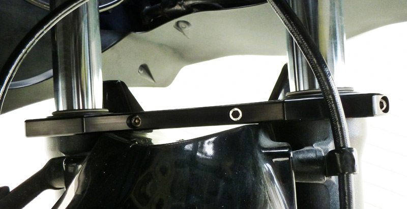 The SV Racing Parts StromBrace bolts easily to the top of the fork tubes, just above the fender.