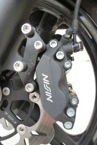 SV Racing Parts Caliper Adapter Bracket allows Nissin or Tokico sportbike brake calipers to be installed on the Suzuki V-Strom.