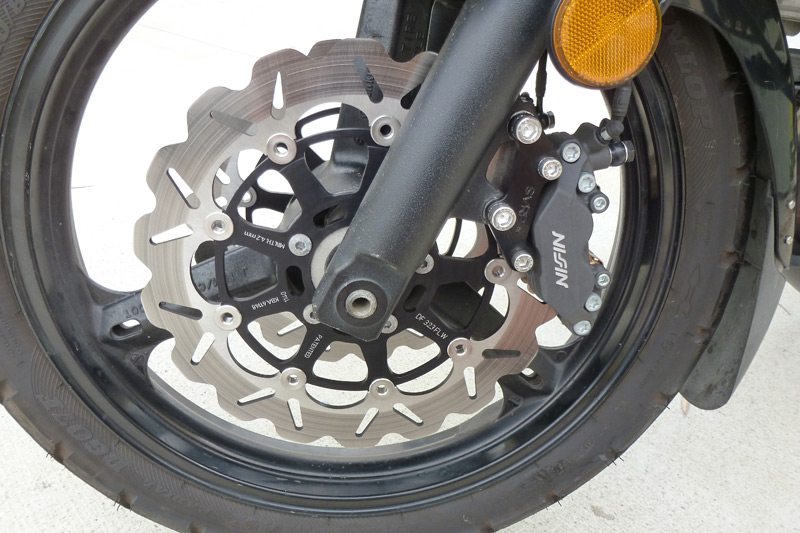 Suzuki V-Strom 1000 front wheel with SV Racing Parts Caliper Adapter Bracket, new Nissin calipers and Galfer wave rotors.
