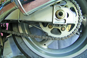 The black tube hanging from the swingarm is the Scottoiler chain oiler.
