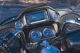 Four analog gauges surround the 6.5-inch touchscreen for the infotainment system.