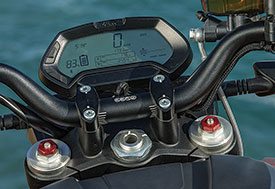 The Zero’s LCD instrument panel shows speed, battery level, time, power mode, bar graphs for torque and regen, and trip/odo functions.