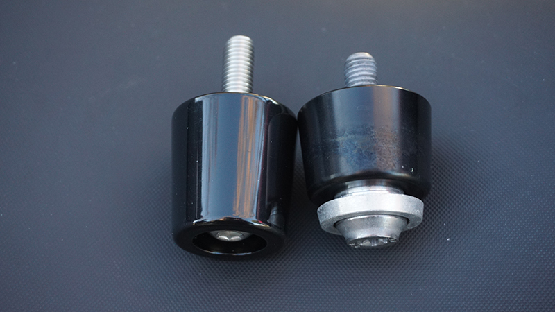 There is a noticeable difference between the HVMP Bar Ends (left) and the stock BMW version (right). The HVMP Bar Ends are both longer and heavier.