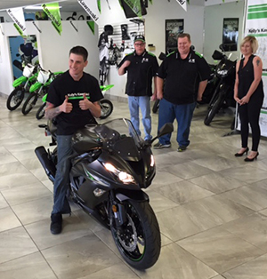 Veteran Brandon Jenkins receives his new Kawasaki Ninja ZX-6R at Kelly's Kawasaki. Brandon's previous bike was destroyed by a suspect fleeing police.