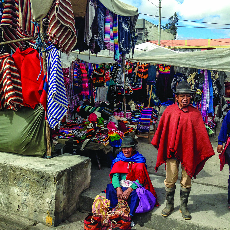 Indigenous men and women trek many miles from villages high in the Andes to sell their wares at the market in Saquisilí. We got great deals on alpaca blankets and sweaters, and haggling was easy since the local currency is U.S. dollars.