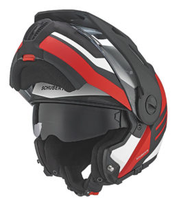 Schuberth E1 modular helmet with chin bar in raised position and sun shield lowered.