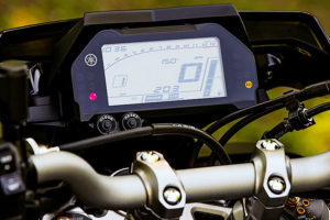 Behind the FZ-10's small windscreen is an all-digital meter.