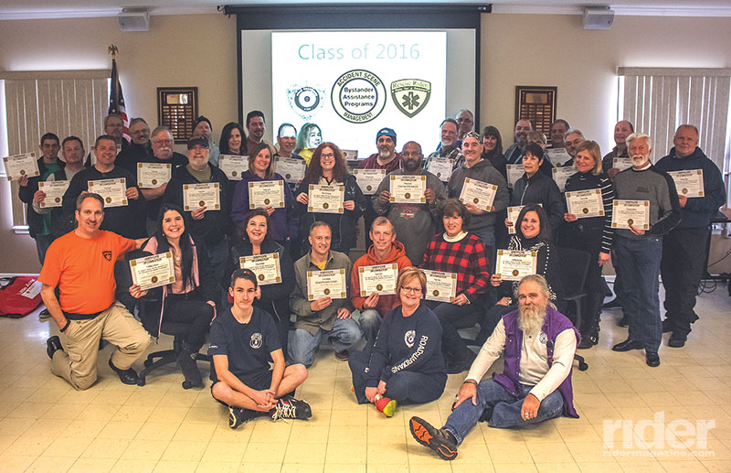 After two full days, course participants show off their certificates.