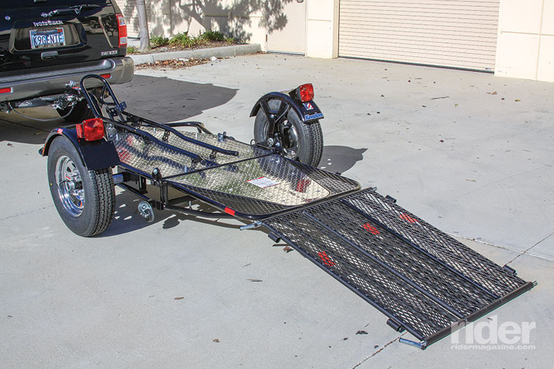 Kendon Stand-Up Motorcycle Trailer. A wide 3-piece ramp allows you to ride a bike on.