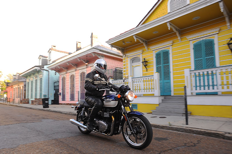 In 2009, riding the updated Triumph Bonneville through New Orleans' colorful French Quarter. (Photo by Tom Riles)