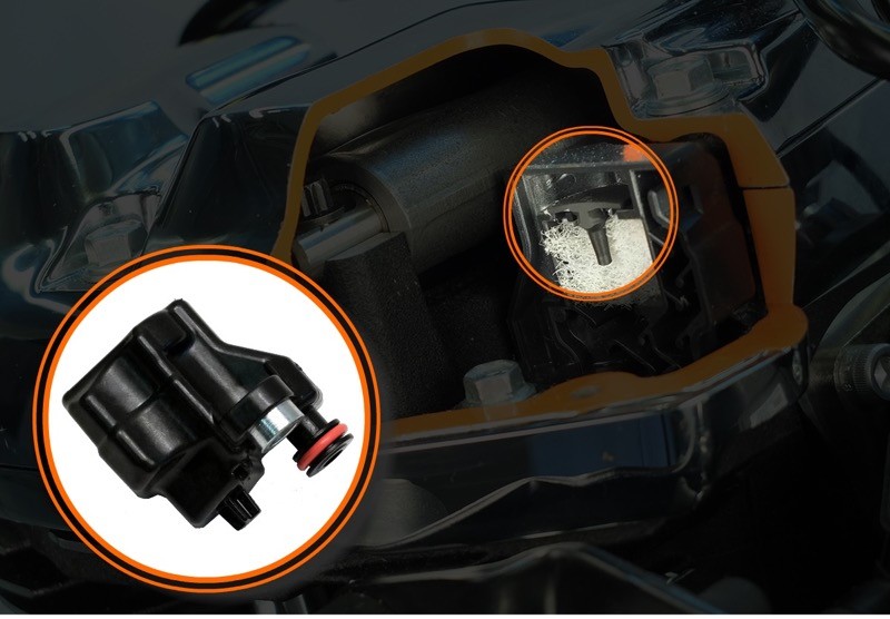 Yes, even though crankcase breathing is routed to a transmission sump cavity, some air and oil will manage to make it into the heads. So, there’s this new one-piece breather valve located in each head. It’s more efficient than earlier designs and has a lot less to deal with in the first place. Call it cheap insurance.