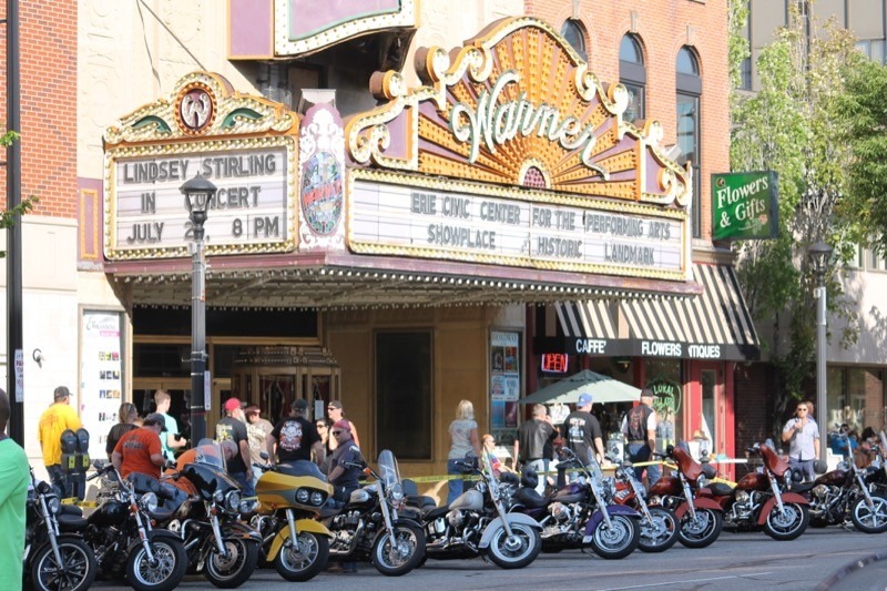  Bikes line State Street in front of the historic Warner Theater