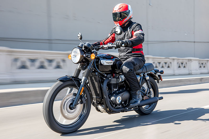 The new-for-2017 Triumph Bonneville T100 Black is a "mini me" of the T120, with similar styling but a smaller, 900cc engine. (Photos by James Martinec, the author and courtesy Triumph)