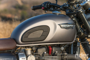 Triumph’s steel tank is reminiscent of the 1960s version, complete with knee pads.