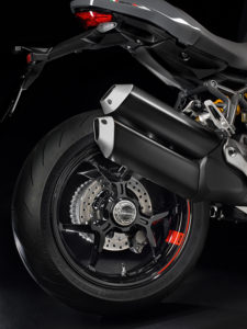The Monster 1200 S rolls on special triple Y-spoke wheels with exclusive "S" graphics. Single-sided swingarm is beefier.