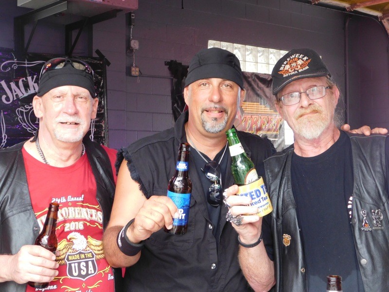 Three amigos celebrate the fall riding season with three different cervezas