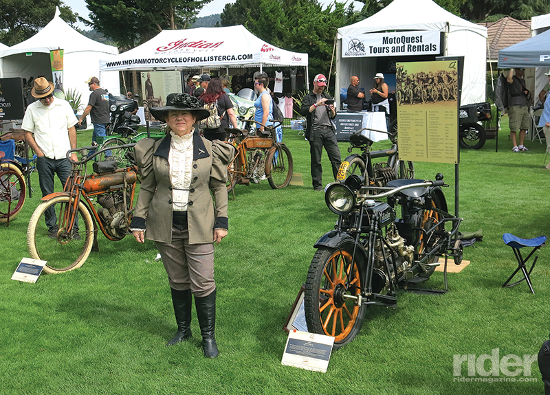 The antique section of the show drew a lot of attention, and here an appropriately dressed lady is standing between a 1911 Flying Merkel (to the left) and a 1915 Militaire.