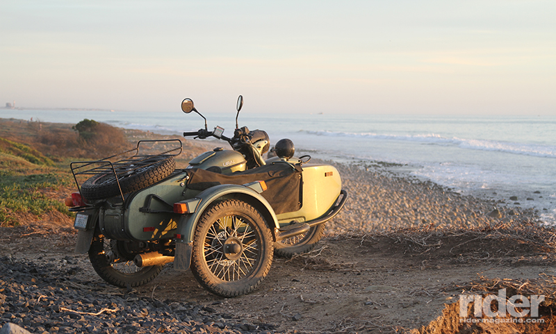 After 500 miles of grueling dual-sport riding, the Ural contemplates a bath in the cold Pacific.