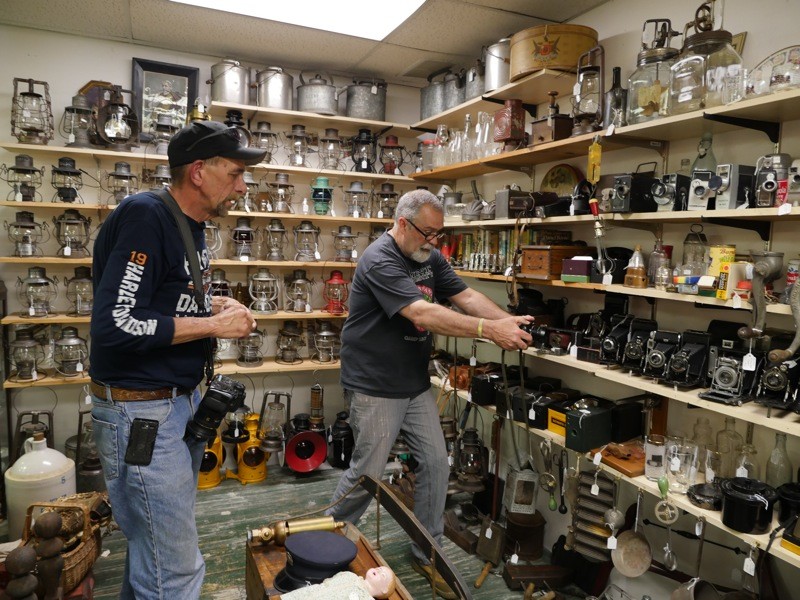 Bill and Rick in awe of the vintage camera display in one of the shops at the Lafayette Mill Antiques Center