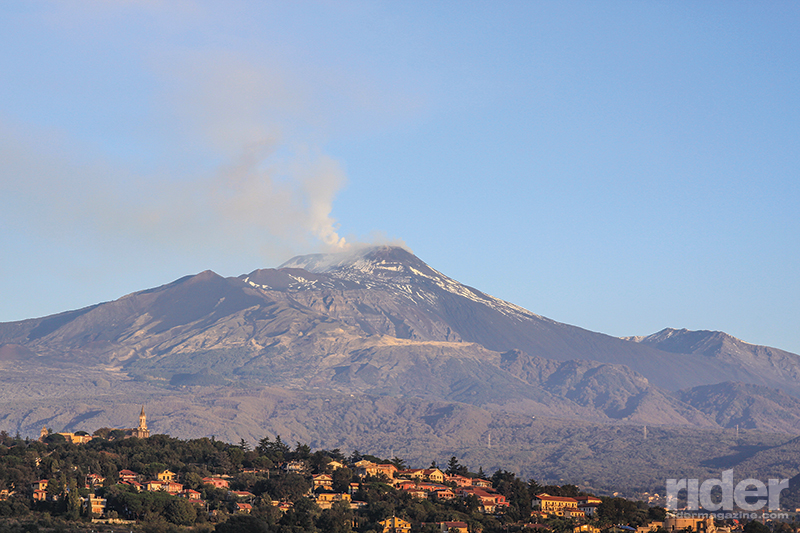 Mighty Mount Etna lets off some steam during the early morning, with the suburbs of Catania huddled along its foothills. Europe’s largest active volcano also has the longest record of continuous eruption.