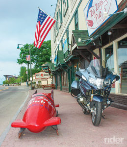This bobsled sits right on a village sidewalk…hop in!