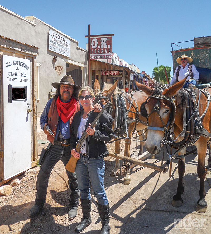 My riding partner gets up close and personal with some O.K. Corral reenactors in Tombstone