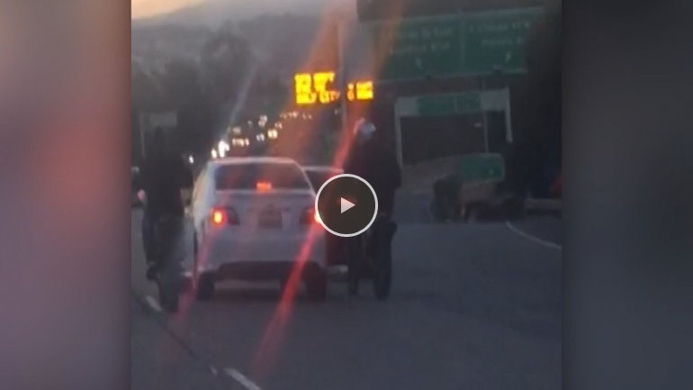 A gang of riders on unlicensed dirt bikes and ATVs beat a motorist who attempted to pass them as they performed stunts on a California freeway.