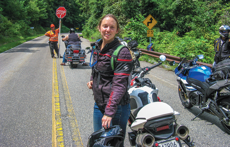 A brief delay due to Skyway resurfacing. Those in cars: windows up and AC on. Those on bikes: making new friends! Our new friend Kyla from Michigan is touring alone on a rented bike. Way to go, Kyla!