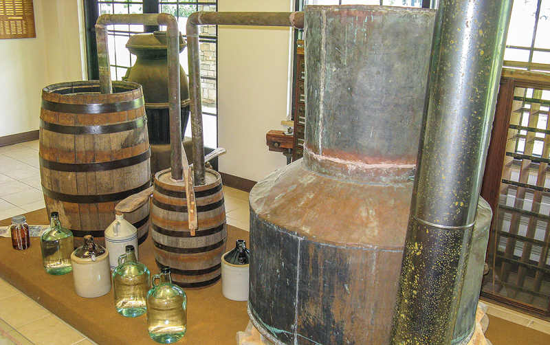 This complete moonshine still at the Charles Hall Museum in Tellico Plains was an anonymous donation; it just showed up one morning. Note the thump keg; don't overfill or it may "puke through."   