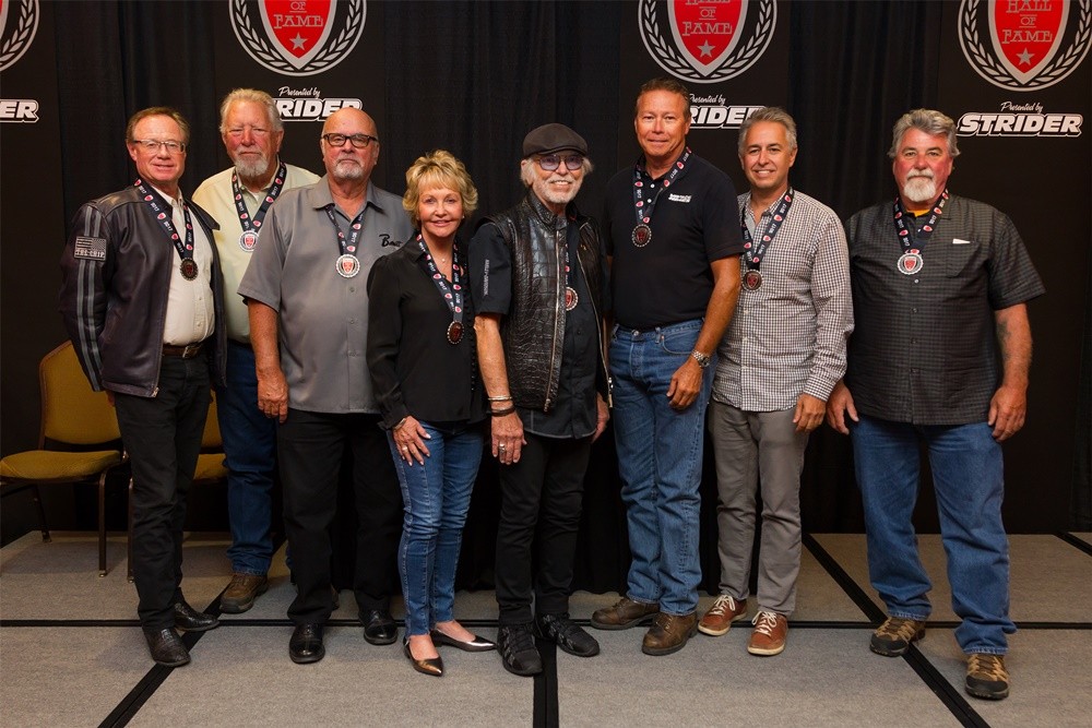 Hall of Fame inductees, (l.–r.) Rod "Woody" Woodruff, Jim Thiessen, Mike Taylor, Colleen Barnett-Taylor, Willie G. Davidson, Terry Vance, Cory Ness, Mark Shadley