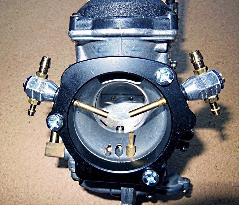 Once installed in whatever manner, you drop three main jet sizes, mount the controller and its air filter (smallest in the world, I think) and you can toss jetting slide rules and the angst of re-jetting… away. Intelajet/Dial-A-Jet takes over and jetting issues become pretty much non-existent.